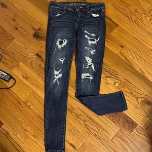 american eagle ripped with patches jeans, size 2